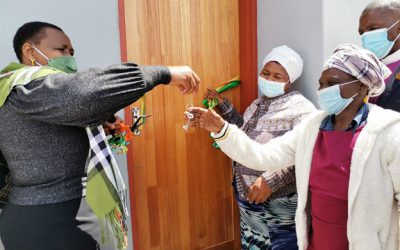 MEC Nonceba Kontsiwe handing over keys of a brand-new home to the destitute beneficiary in Tolofiyeni village.